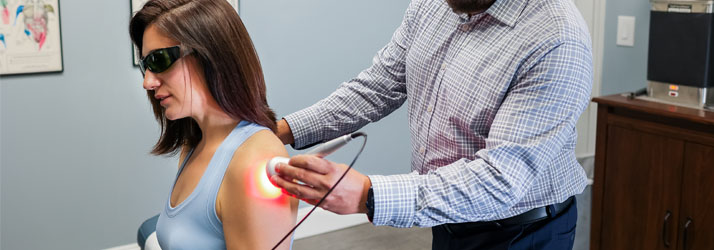 Chiropractor Burke VA Todd Sullivan Treating A Patient Chiropractor Burke VA Todd Sullivan Treating A Patient
